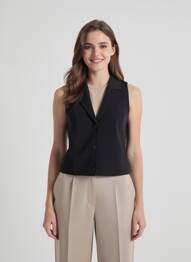 Gilet sans manche fausses poches noir HBT femme