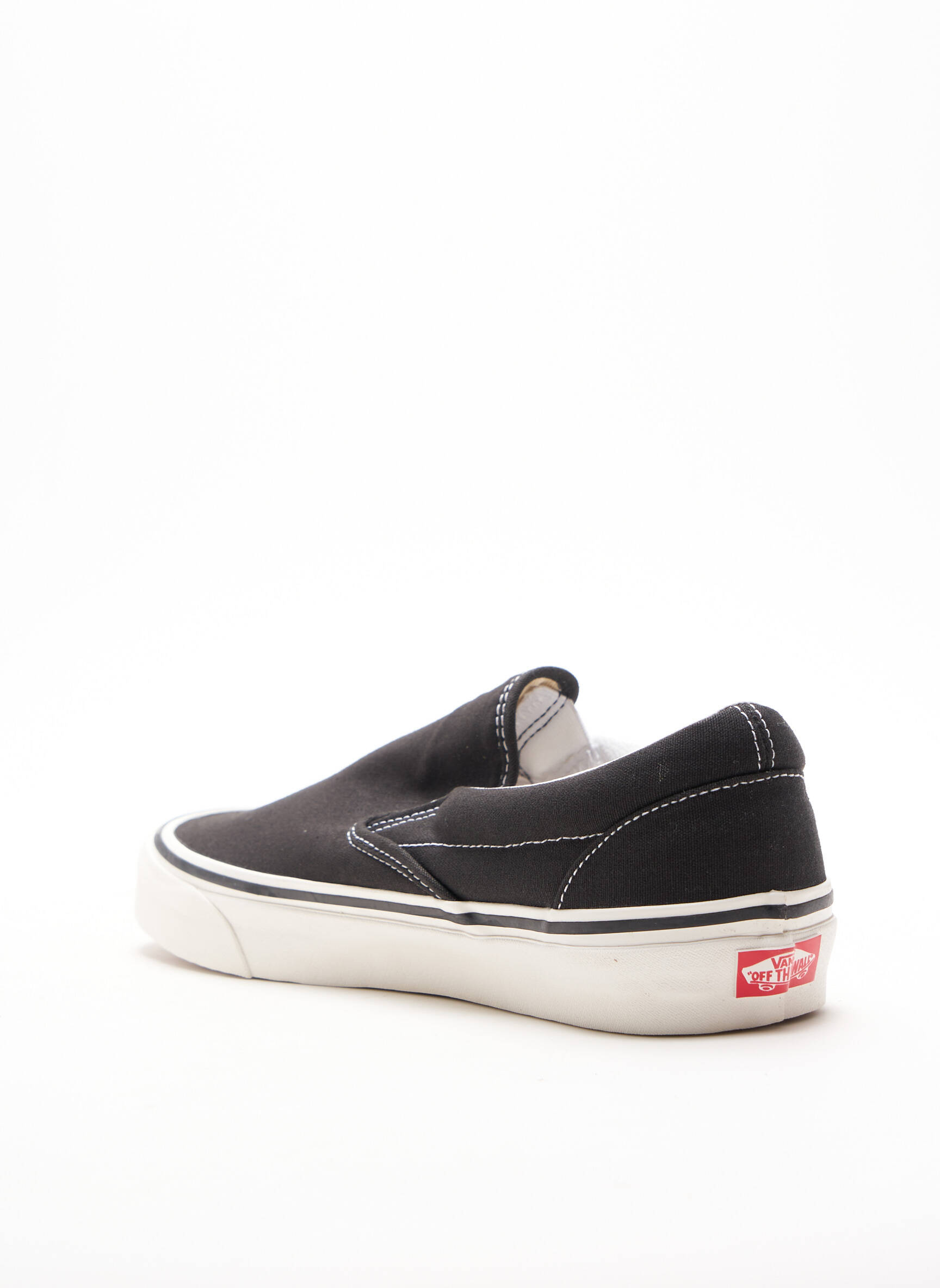 Vans slip on online noir homme