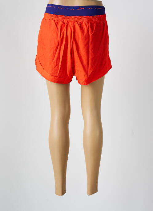 Short orange ALTO GIRO pour femme