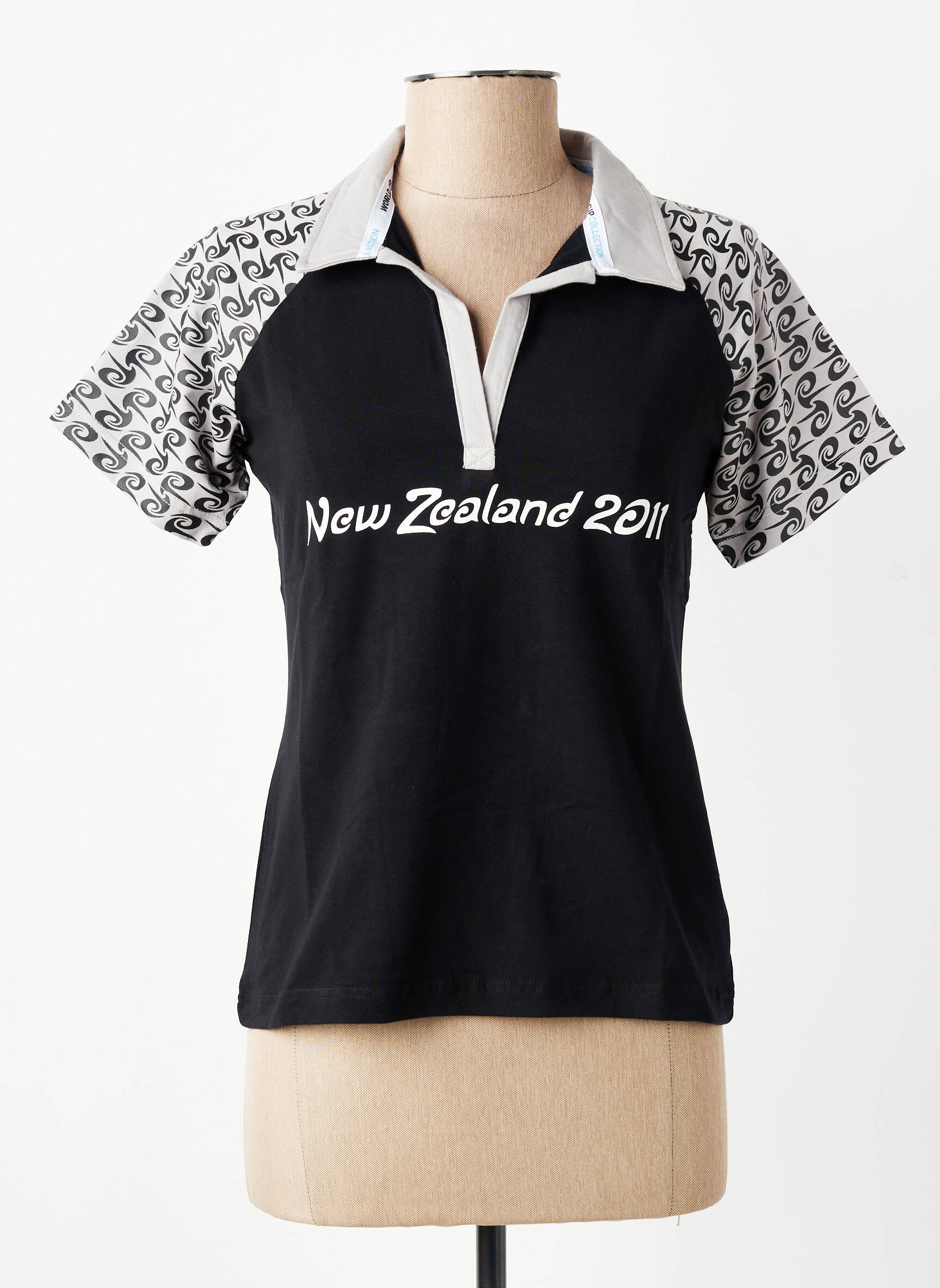 Polo coupe droite manches courtes noir WORLD CUP femme