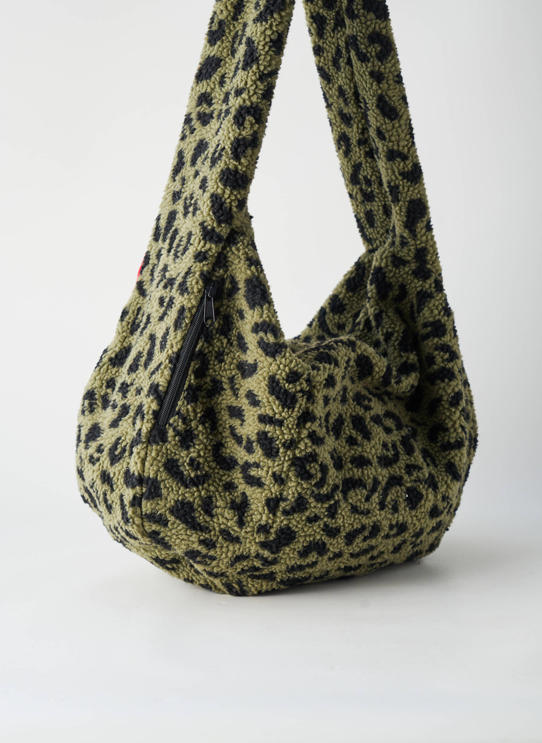 Sac fermeture zippée forme bourse vert REISENTHEL femme